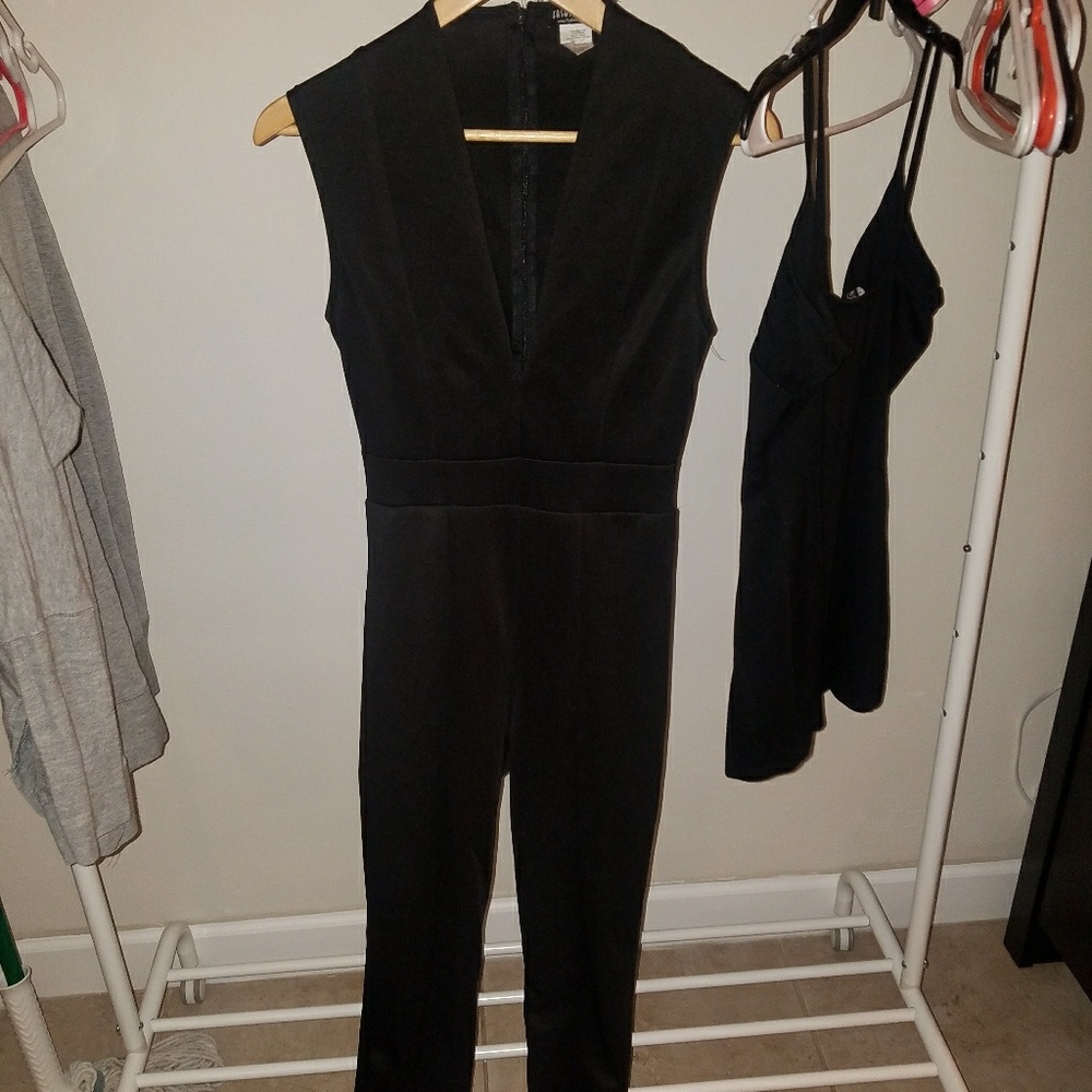 **2** items. Black shorts romper & black jumpsuit